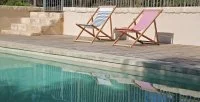 Les Cabanes de Carelles - piscine &copy; Les Cabanes de Carelles