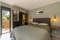 Suite C&eacute;ladon - Chambre &copy; Casa Dina