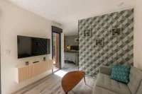 Suite C&eacute;ladon - c&ocirc;t&eacute; salon &copy; Casa Dina