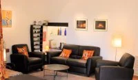 Meubl&eacute; de tourisme - Salon &copy; Auberge du C&egrave;dre