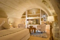H&ocirc;tel - Chambre avec vo&ucirc;tes en pierre &copy; Ch&acirc;teau de Pondres
